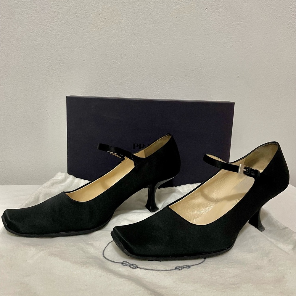 Prada satin pumps.
